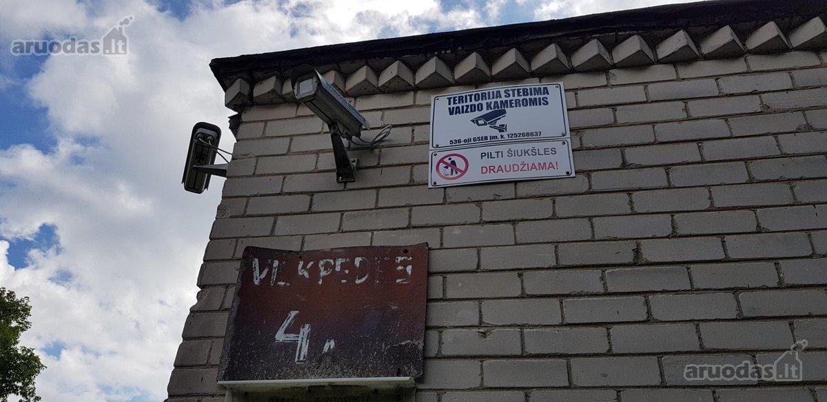 Tvarkingas mūrinis garažas. Įvažiavimas pro