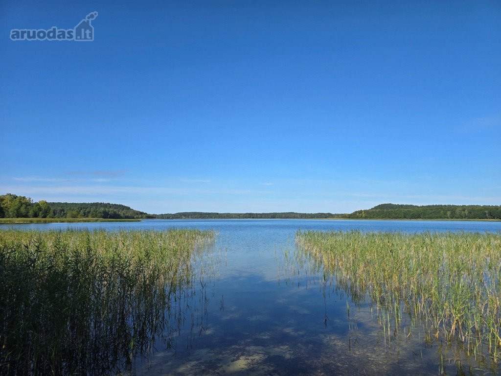 Su sklypu prie ežero, miškų, ežerų, kalvų ir