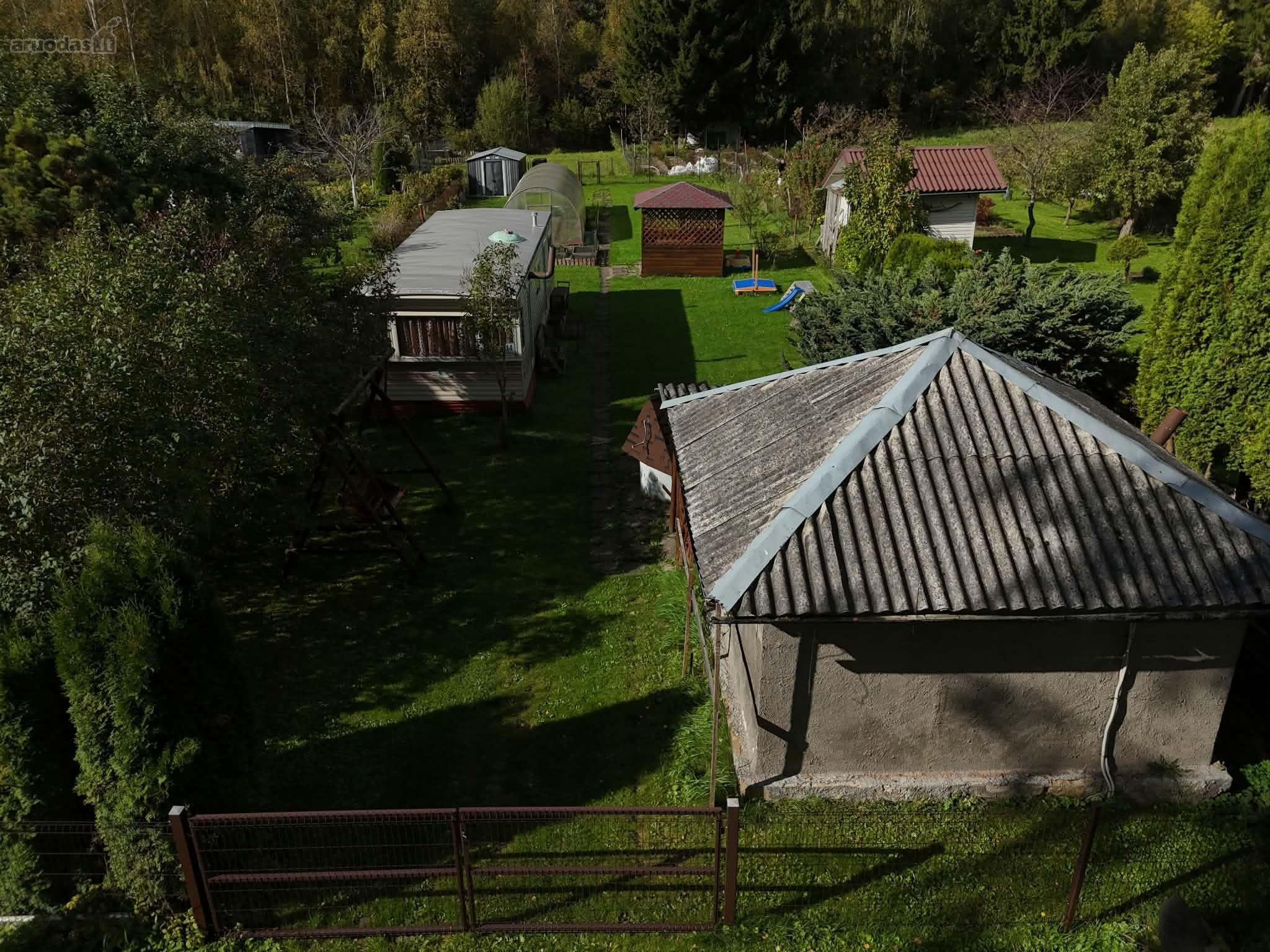 Parduodamas 6a sodo sklypas su mediniu