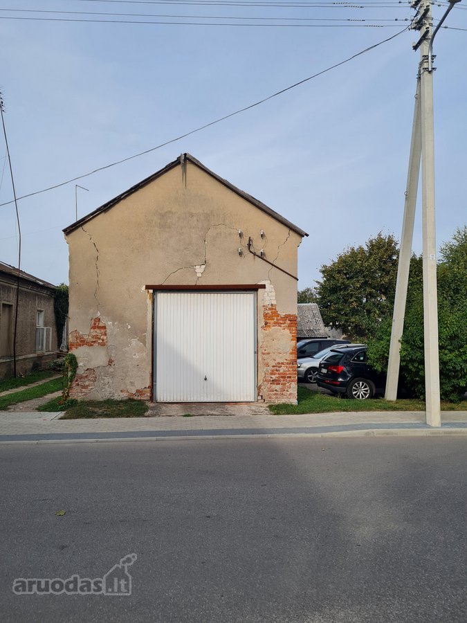Parduodamas sandėlis/garažas su nuosavu žemės