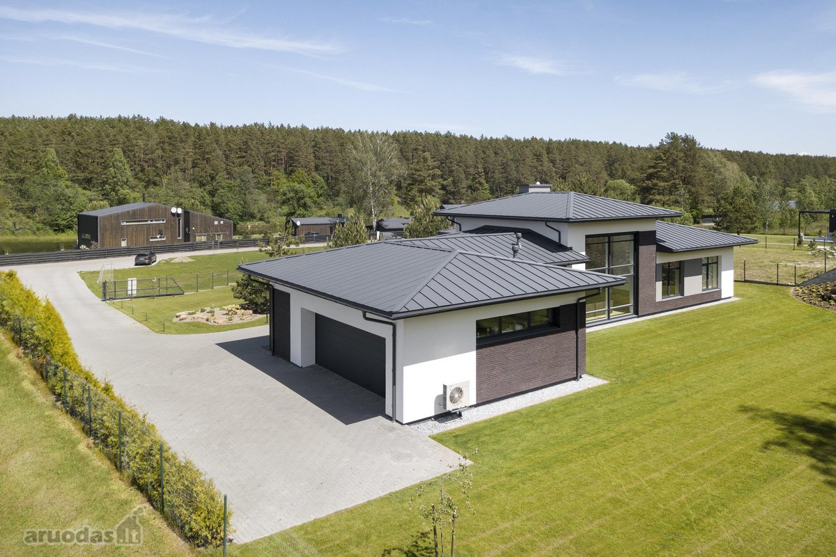 Išskirtinės architektūros namas prie upės - nuotraukos Nr. 7