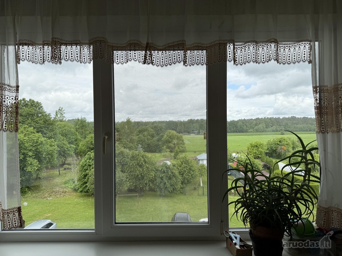 2 kambarių butas su net 15 arų nuosavos žemės