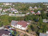 Parduodama namo dalis su sklypu, ramioje