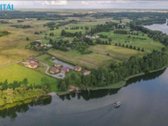 Parduodama labai graži, smėlėtu krantu