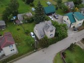 Erdvus dviejų aukštų namas Šilalėje – puiki