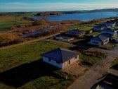 Naujai suformuotame gyvenamųjų namų kvartale,
