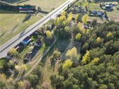 Parduodamas miško apsuptyje esantis 5.07 arų - nuotraukos Nr. 2