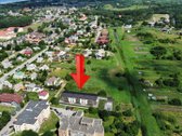 Parduodamas sklypas su 6 butų kotedžo
