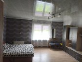 Butas su dalimi ūkinių pastatų ir dalimi