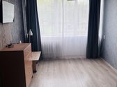 Butas tvarkingas . Įėjimu į laiptinę