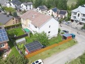 Parduodama namo dalis - butas su žemės sklypu