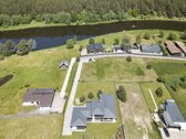 Išskirtinės architektūros namas prie upės - nuotraukos Nr. 10