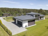 Išskirtinės architektūros namas prie upės - nuotraukos Nr. 7