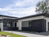 Išskirtinės architektūros namas prie upės - nuotraukos Nr. 5
