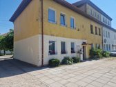 Parduodamas 2 kambarių butas su nuosavu žemės