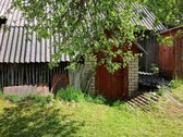 Gyvenamas namas su žemės sklype esančiais