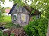 Gyvenamasis namas su sandėliu ir žemės sklypu