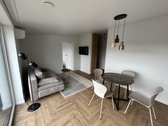 Išnuomojamas 2 kambarių butas naujos statybos - nuotraukos Nr. 2