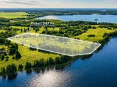 Išskirtinis 3,87 ha sklypas tarp dviejų ežerų