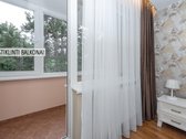 Šviesus ir jaukiai įrengtas butas žalumos - nuotraukos Nr. 11