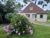 3 kambarių butas/namo dalis su 0,3727 ha