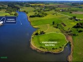Parduodamas erdvus ir lygus 1,13 ha žemės