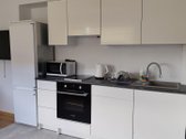 Miesto centre, erdvus 70 kv.m. butas su - nuotraukos Nr. 10